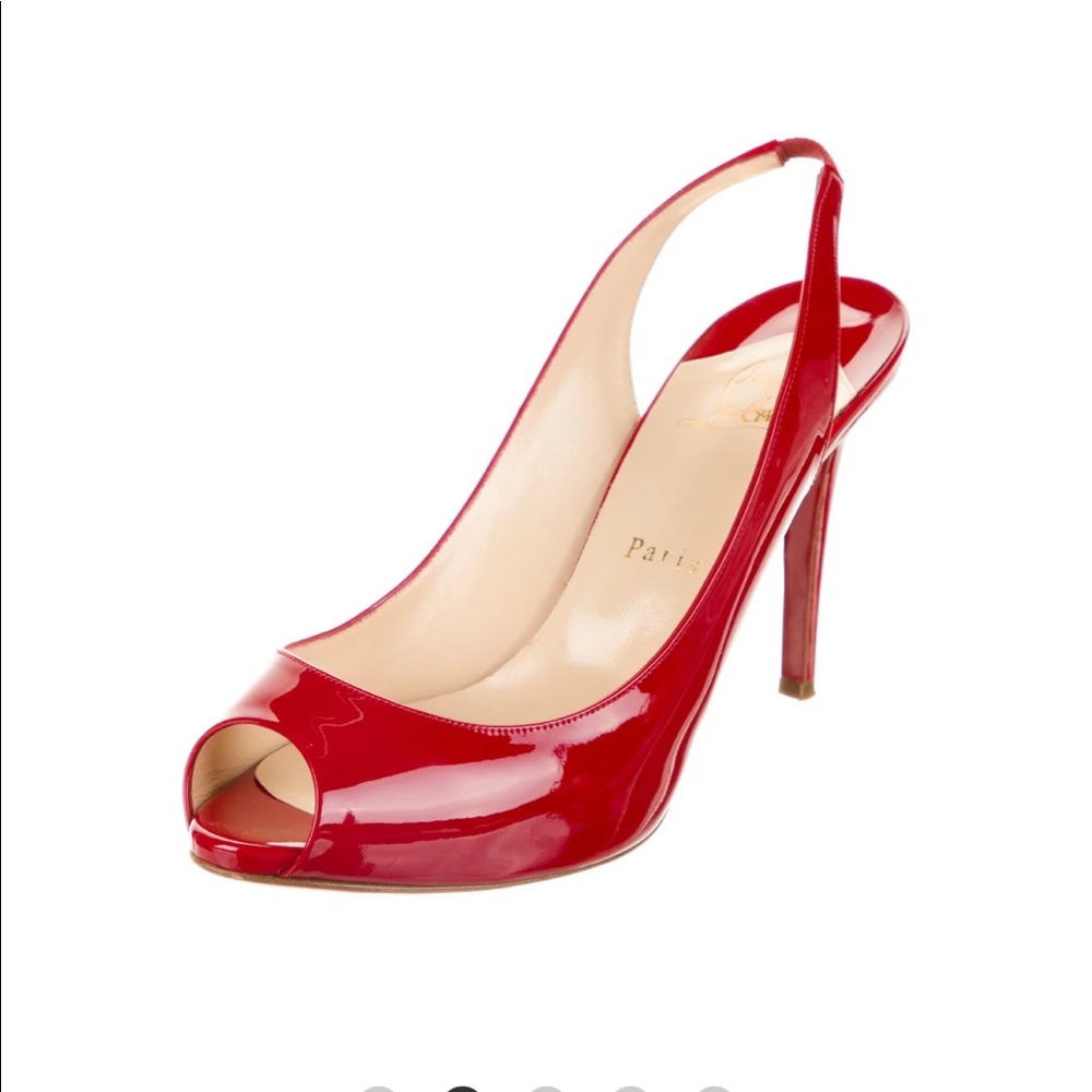 Louboutin red peep toe. Very sexy …